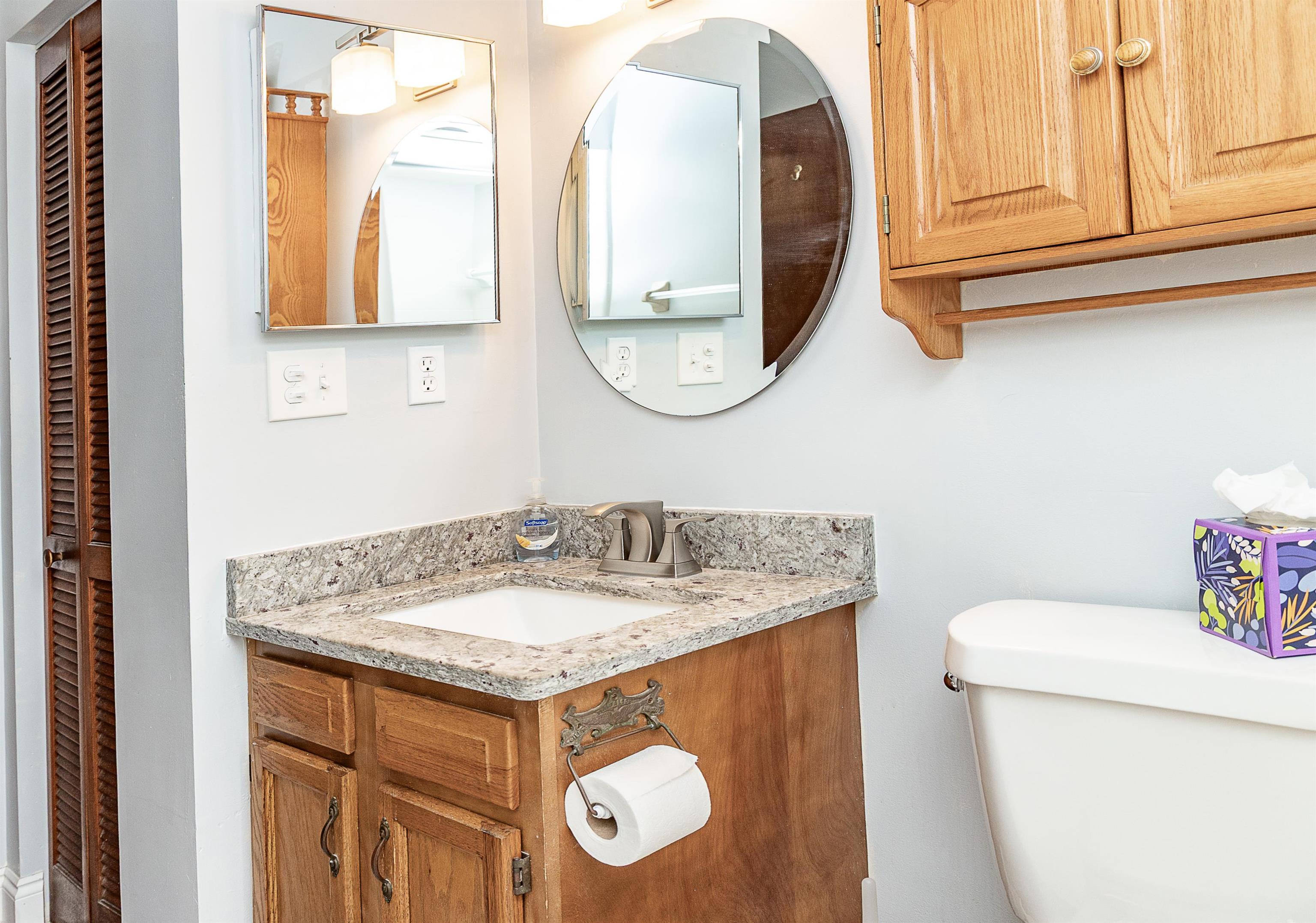 357 Orchis Road St. Augustine, FL 32086 - Photo 40 of 54 a bathroom with a sink and a vanity