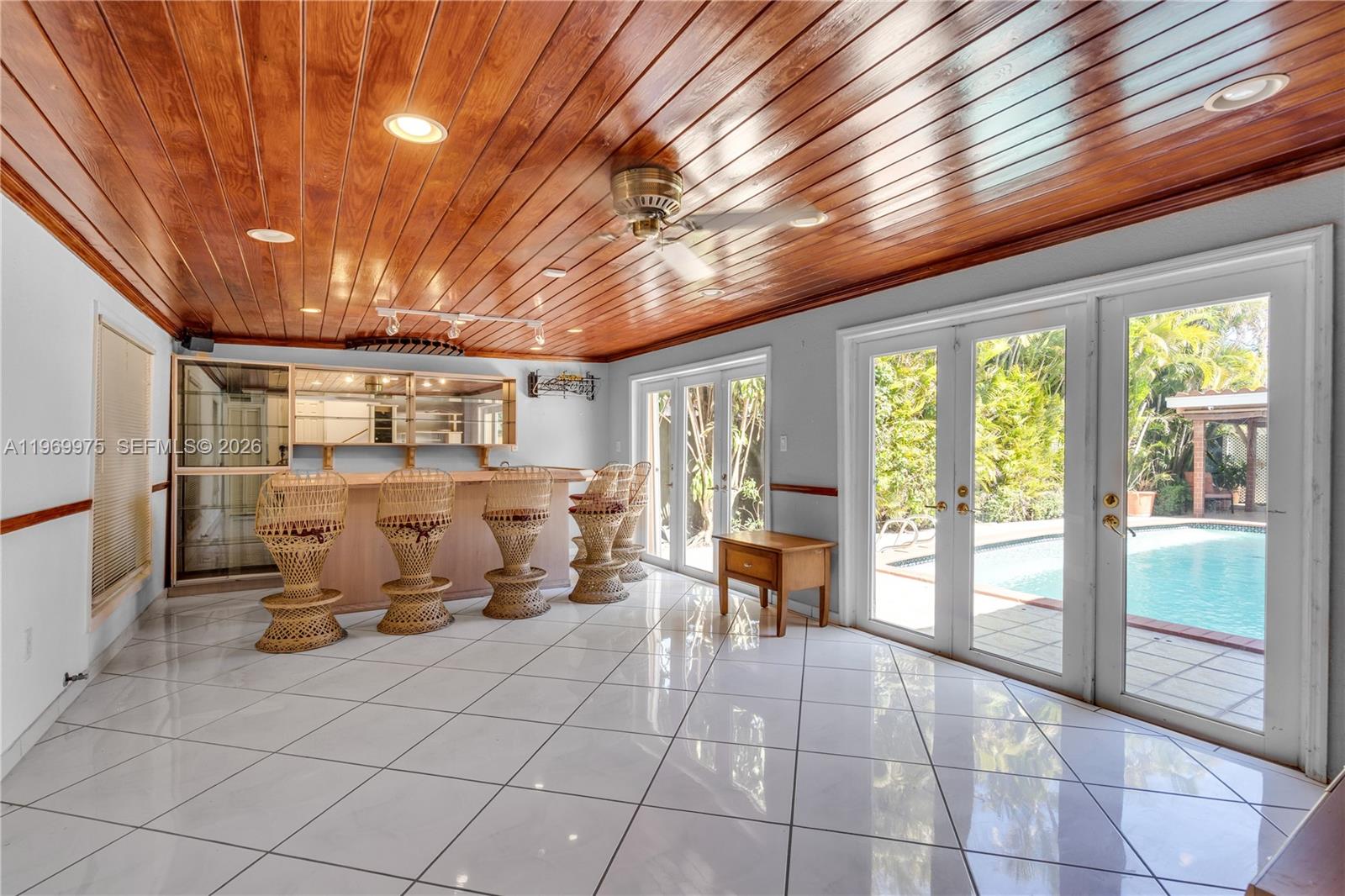 7941 Southwest 18th Terrace Miami, FL 33155 - Photo 20 of 60 a room with lot of large windows