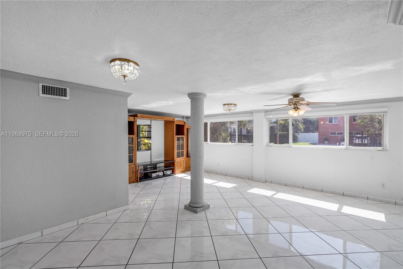7941 Southwest 18th Terrace Miami, FL 33155 - Photo 27 of 60 a view of an empty room with a window