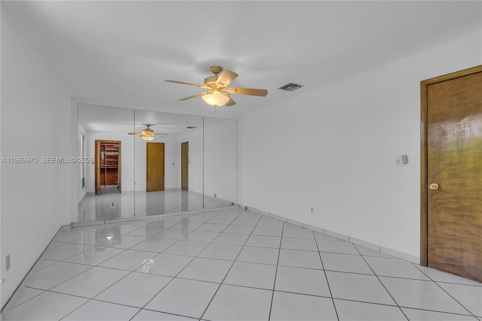 7941 Southwest 18th Terrace Miami, FL 33155 - Photo 37 of 60 a view of an empty room with a window