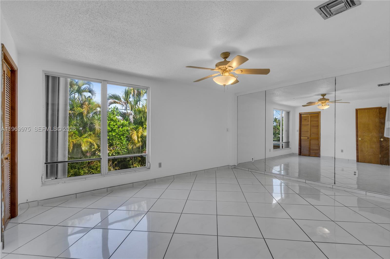 7941 Southwest 18th Terrace Miami, FL 33155 - Photo 39 of 60 a view of an empty room with a window