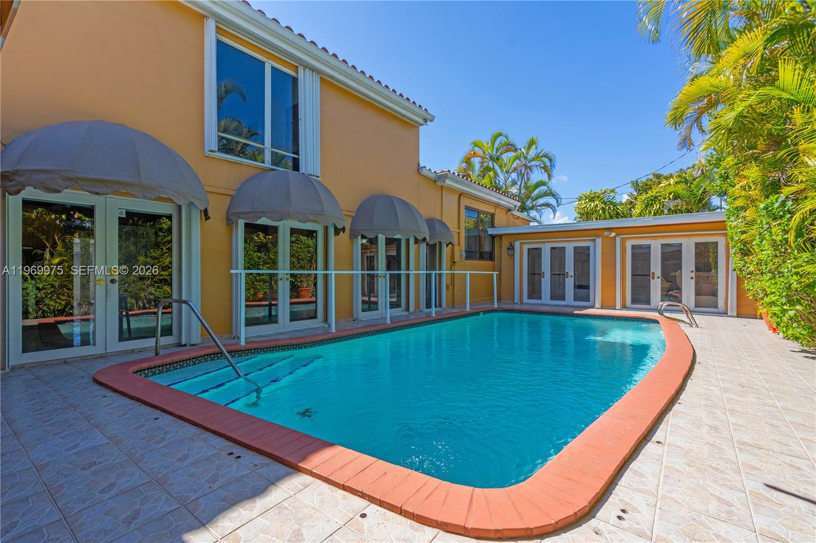7941 Southwest 18th Terrace Miami, FL 33155 - Photo 43 of 60 a view of a house with swimming pool