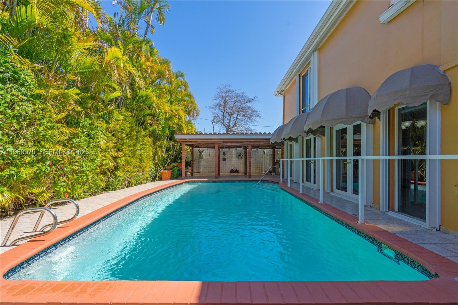 7941 Southwest 18th Terrace Miami, FL 33155 - Photo 44 of 60 a view of a house with a backyard
