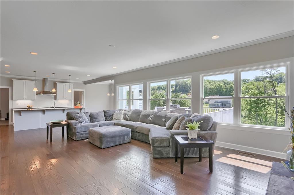 237 Tamarack Drive Gibsonia, PA 15044 - Photo 11 of 48 a living room with furniture and a large window