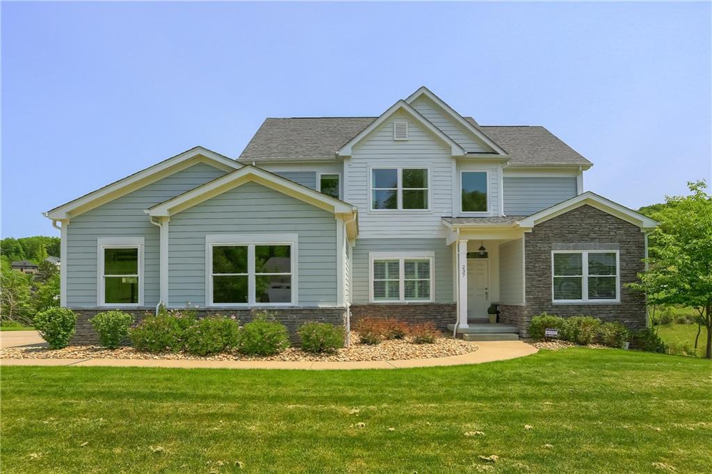237 Tamarack Drive Gibsonia, PA 15044 - Photo 2 of 48 a front view of a house with a yard
