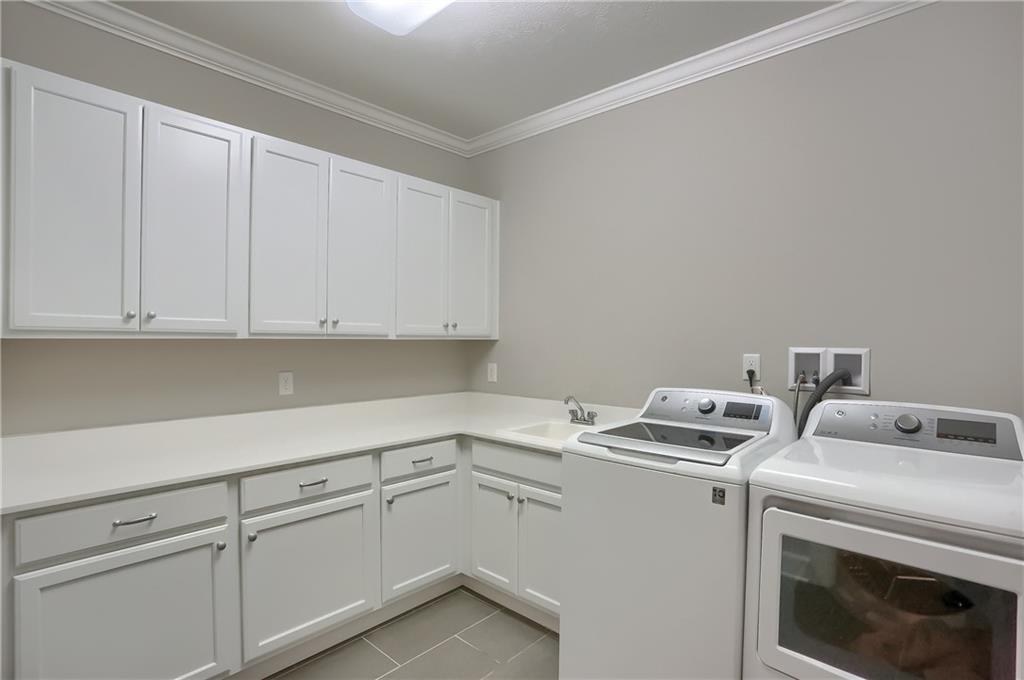 237 Tamarack Drive Gibsonia, PA 15044 - Photo 22 of 48 a utility room with dryer and washer