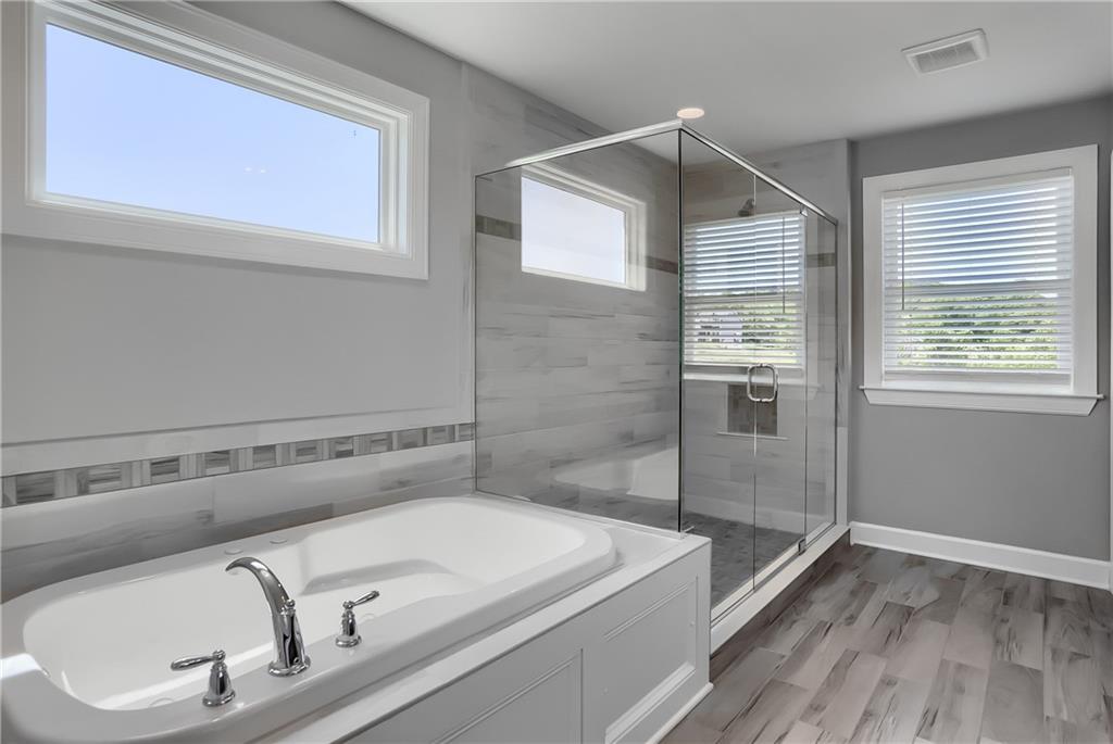 237 Tamarack Drive Gibsonia, PA 15044 - Photo 26 of 48 a bathroom with a tub and a sink