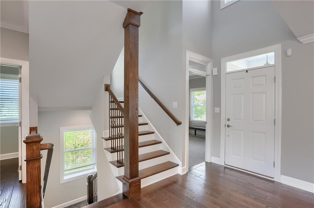 237 Tamarack Drive Gibsonia, PA 15044 - Photo 3 of 48 a view of entryway with wooden floor and stairs