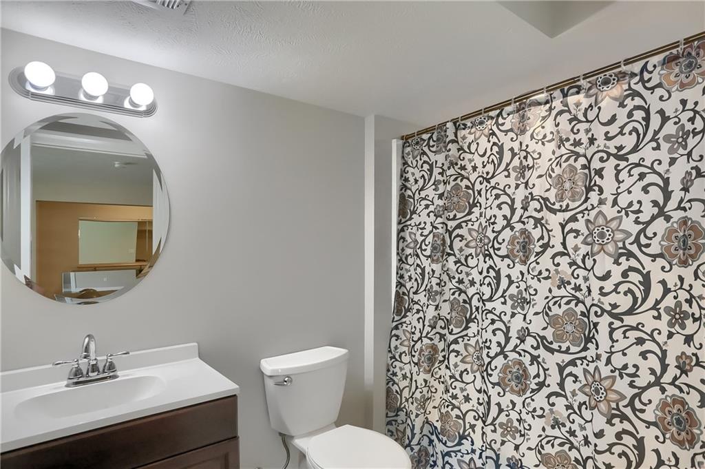 237 Tamarack Drive Gibsonia, PA 15044 - Photo 32 of 48 a bathroom with a sink toilet and mirror