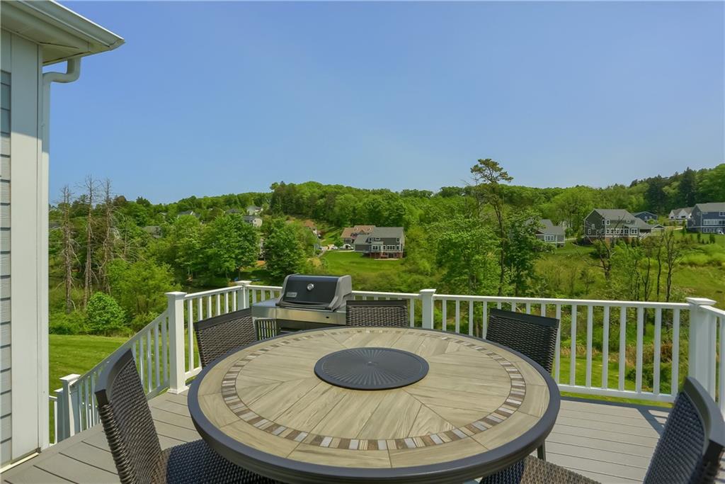 237 Tamarack Drive Gibsonia, PA 15044 - Photo 42 of 48 a view of a wooden deck and a patio