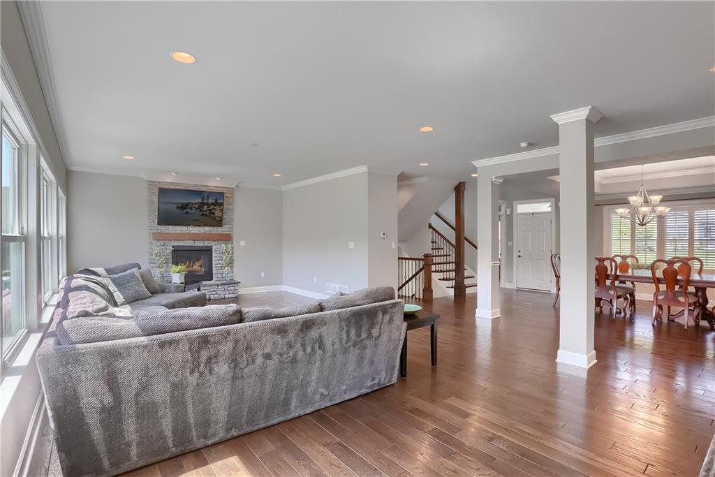 237 Tamarack Drive Gibsonia, PA 15044 - Photo 9 of 48 a living room with furniture wooden floor and a table