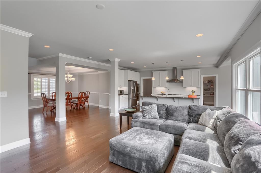 237 Tamarack Drive Gibsonia, PA 15044 - Photo 10 of 48 a living room with furniture and kitchen view with wooden floor