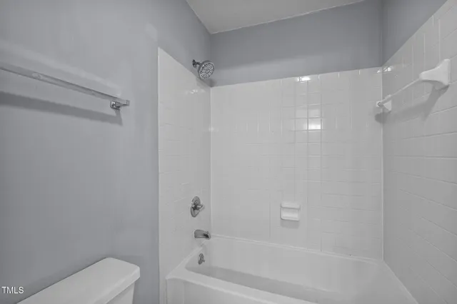 a bathroom with a double vanity sink and mirror