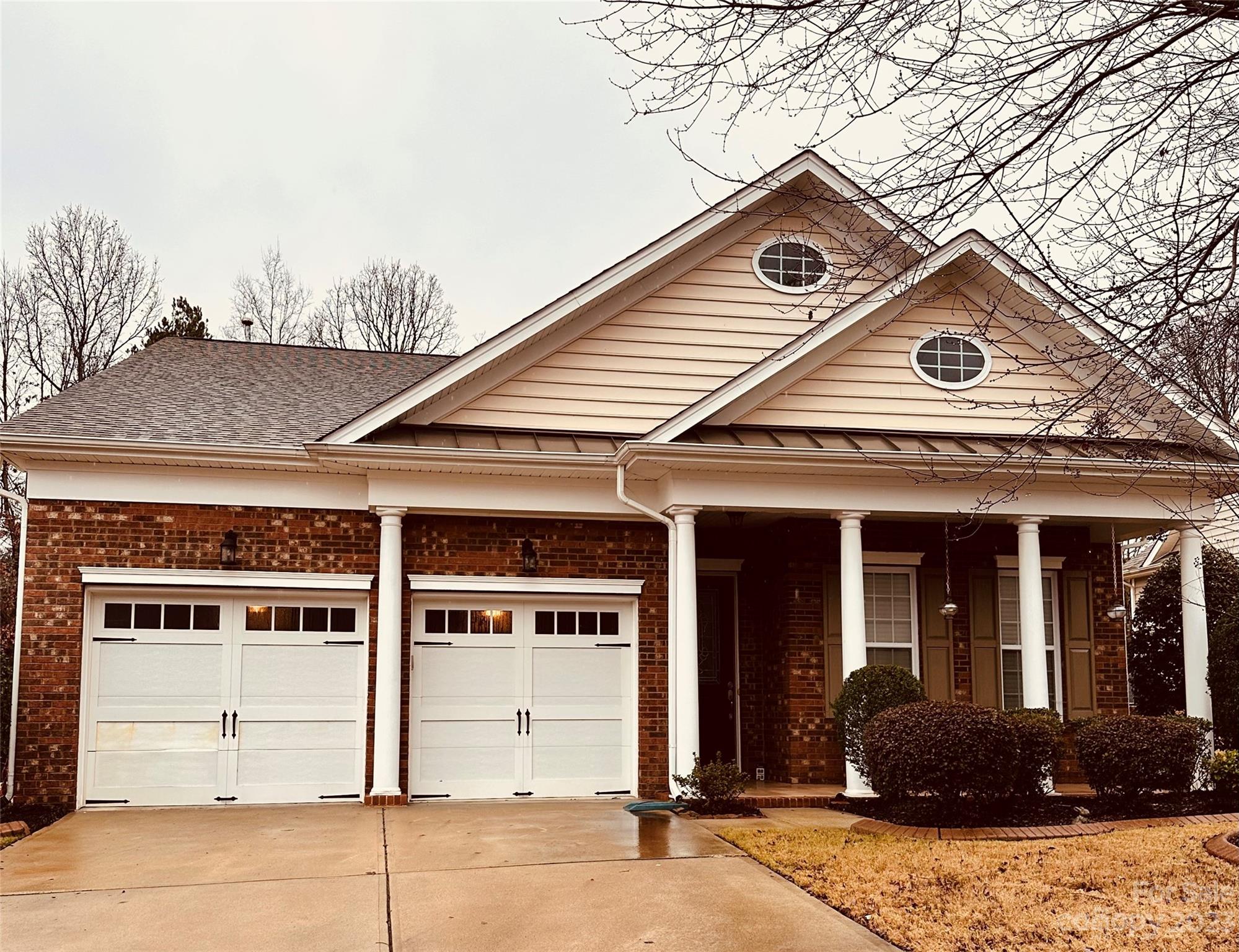 1168 Gold Rush Court Fort Mill, SC 29708 - Photo 1 of 1 a front view of a house with a garden