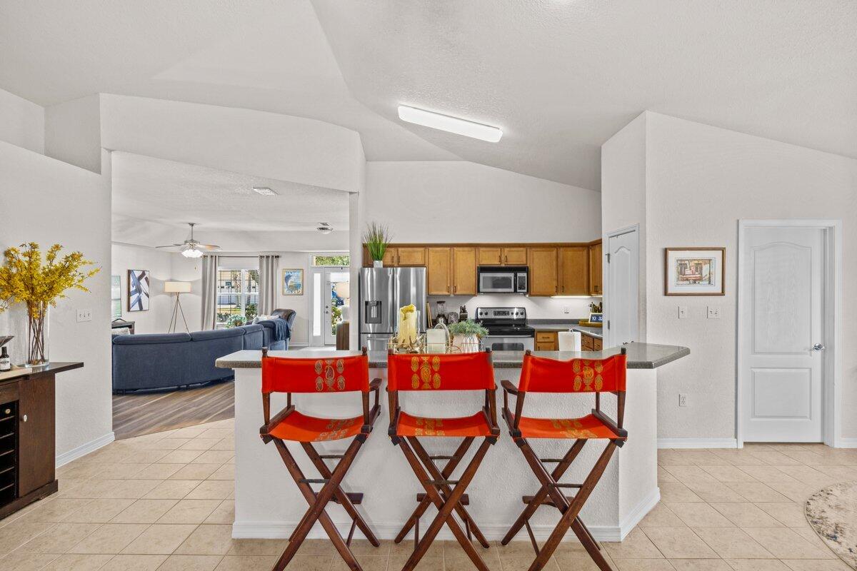 40 Red Bay Court Santa Rosa Beach, FL 32459 - Photo 14 of 49 a dining room with a table and chairs