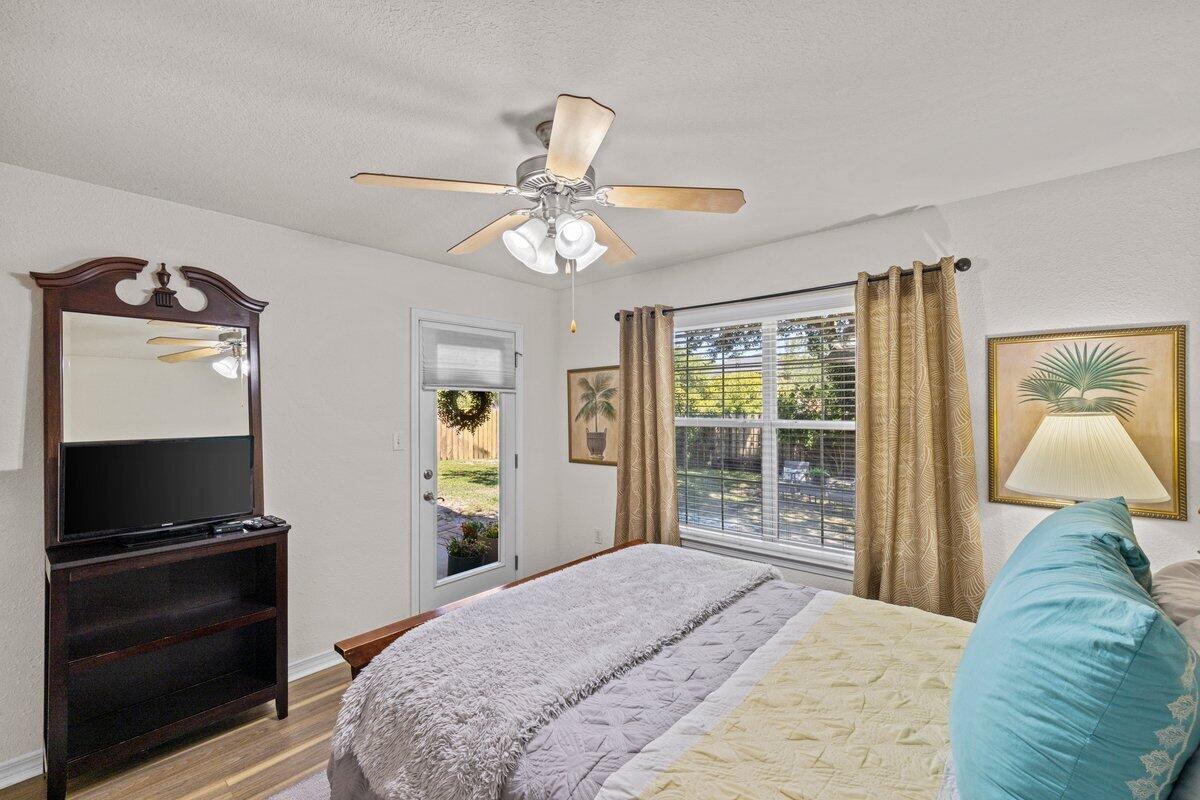 40 Red Bay Court Santa Rosa Beach, FL 32459 - Photo 21 of 49 a bedroom with a bed and a television