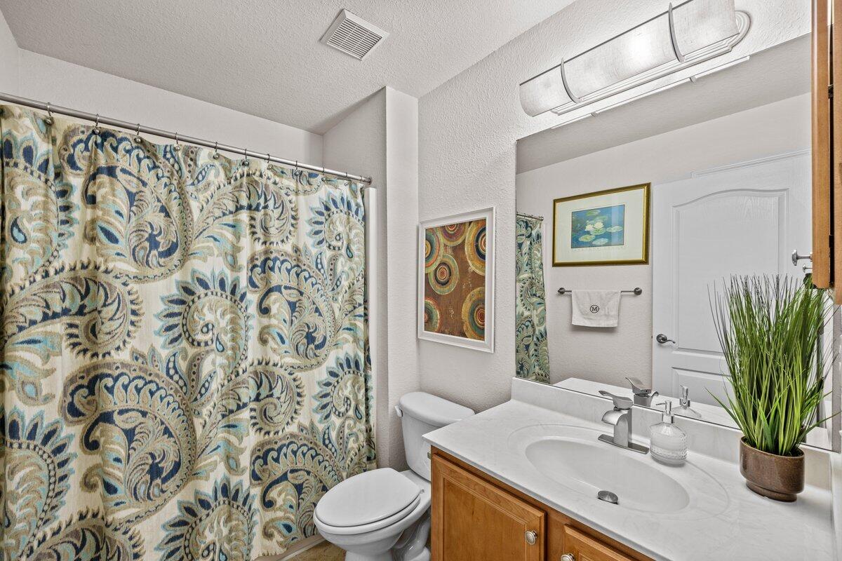 40 Red Bay Court Santa Rosa Beach, FL 32459 - Photo 22 of 49 a bathroom with a sink toilet and shower