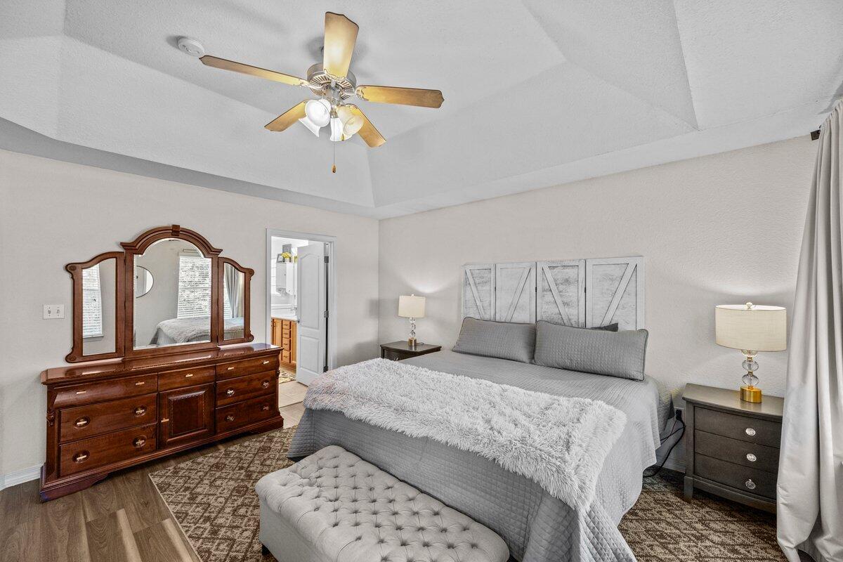 40 Red Bay Court Santa Rosa Beach, FL 32459 - Photo 24 of 49 a bedroom with a bed and a dresser