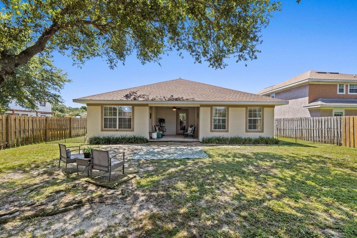 40 Red Bay Court Santa Rosa Beach, FL 32459 - Photo 32 of 49 a view of a house with a yard