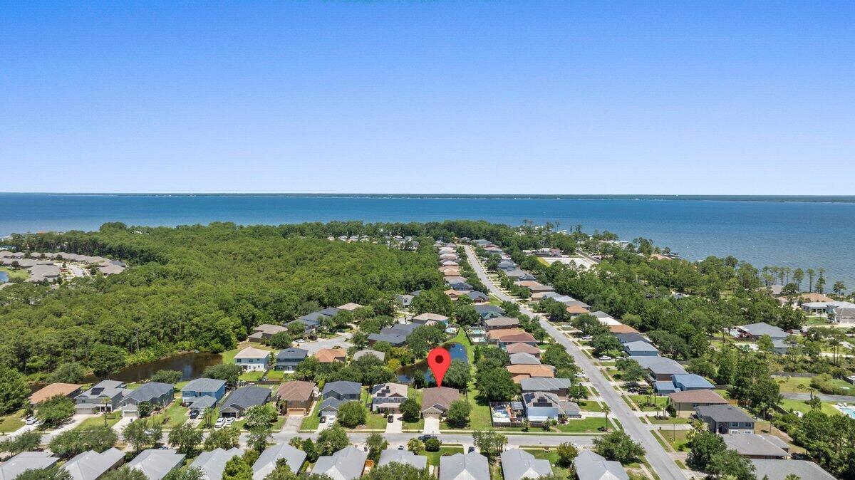 40 Red Bay Court Santa Rosa Beach, FL 32459 - Photo 35 of 49 an aerial view of residential houses with outdoor space and trees