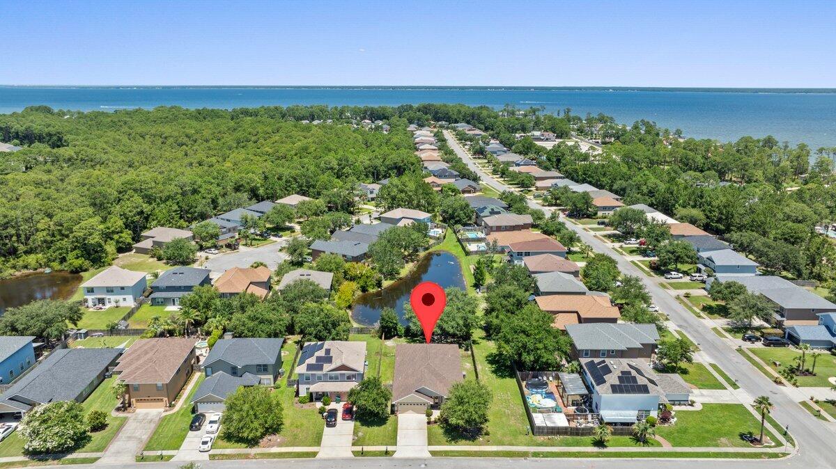 40 Red Bay Court Santa Rosa Beach, FL 32459 - Photo 36 of 49 an aerial view of residential houses with outdoor space and trees