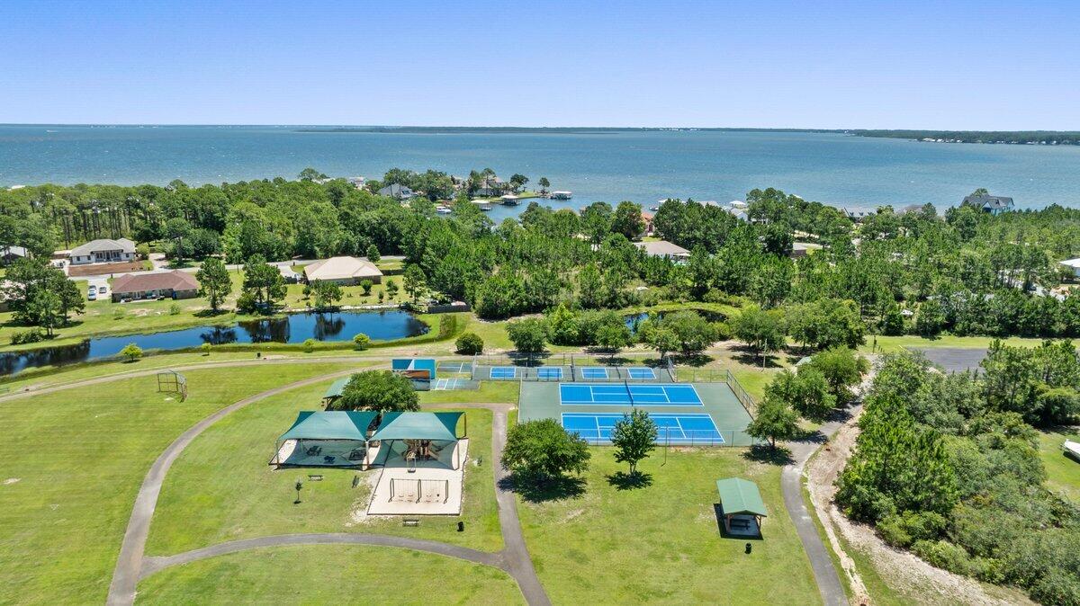 40 Red Bay Court Santa Rosa Beach, FL 32459 - Photo 47 of 49 a view of a city with lawn chairs