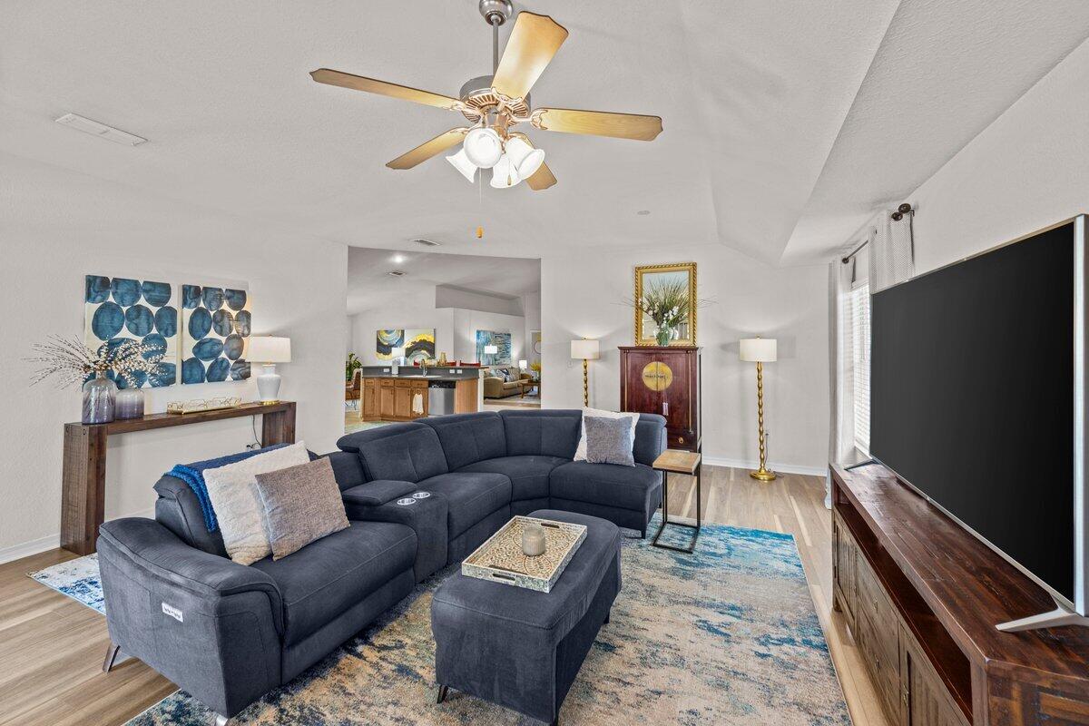 40 Red Bay Court Santa Rosa Beach, FL 32459 - Photo 7 of 49 a living room with furniture and a flat screen tv