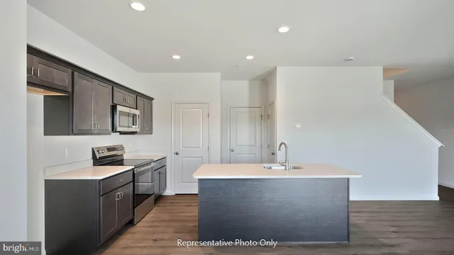 a spacious bathroom with a sink a mirror and bathtub