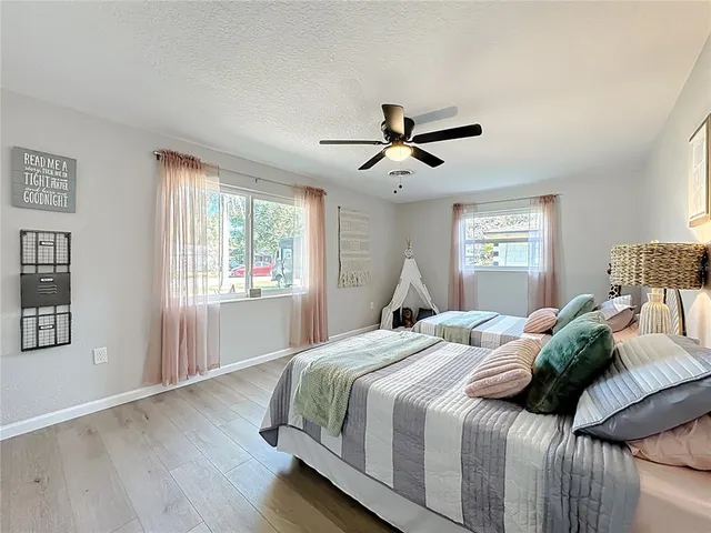 a bathroom with a double vanity sink mirror and
