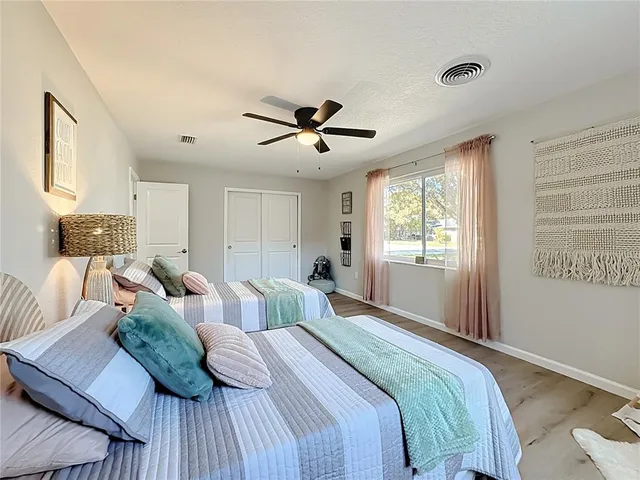 a bathroom with a toilet and shower