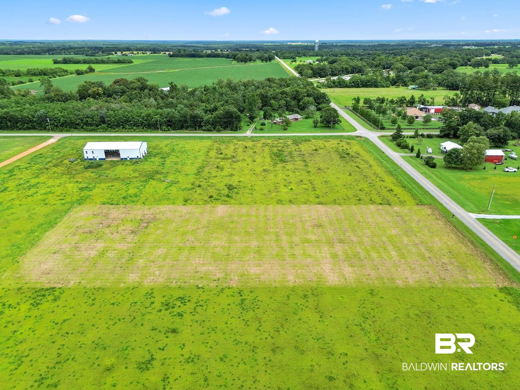 Lot 5 Brewer Road Robertsdale, AL 36567 - Photo 5 of 8 Drone / aerial view with a rural view