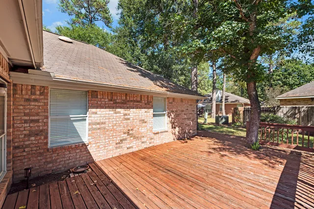 a view of a house with a wooden floor