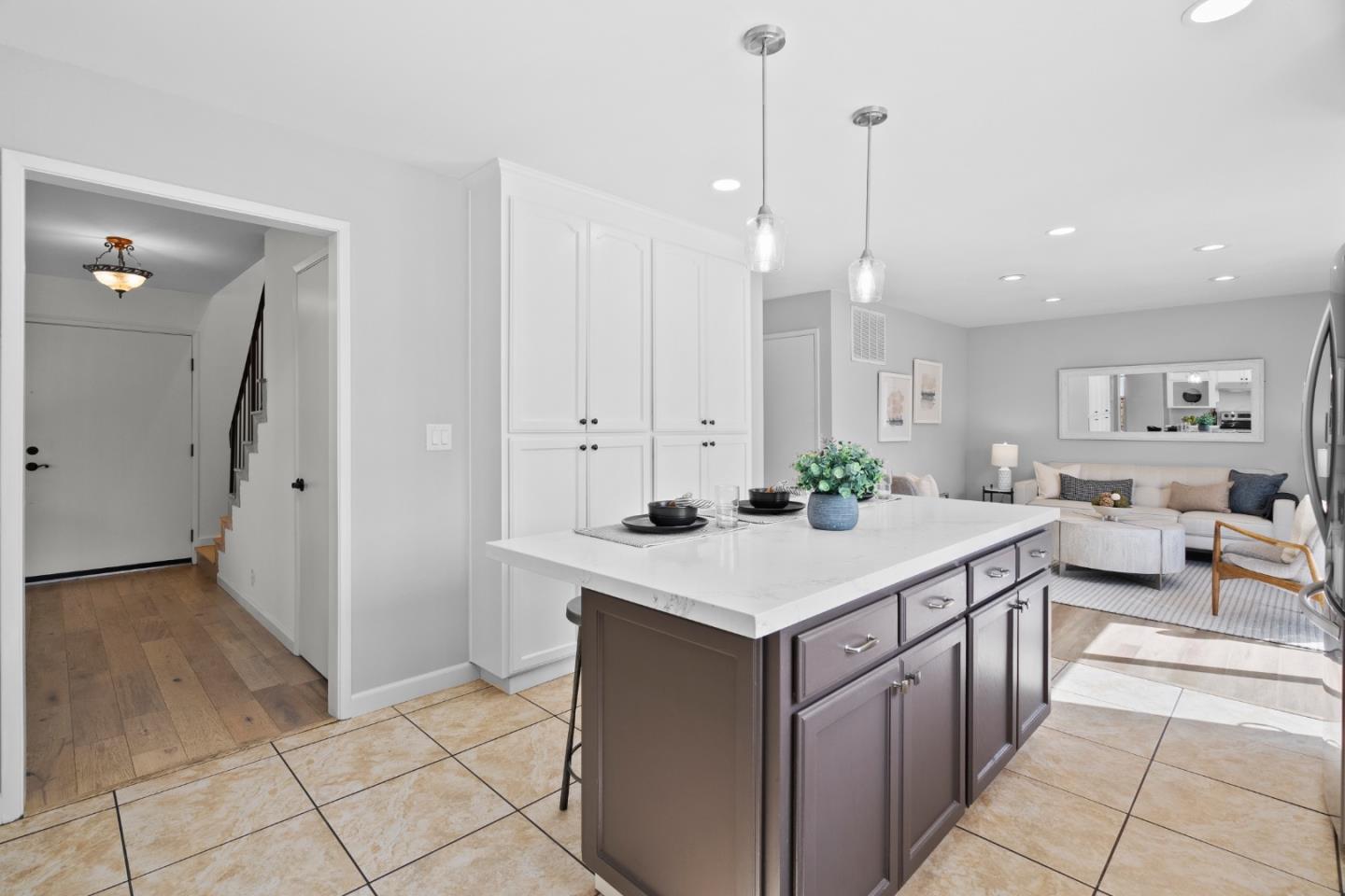 3585 Surry Place Fremont, CA 94536 - Photo 12 of 47 a kitchen with a sink a counter and cabinets