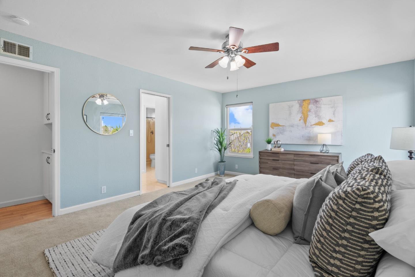 3585 Surry Place Fremont, CA 94536 - Photo 19 of 47 a bedroom with a bed and chandelier