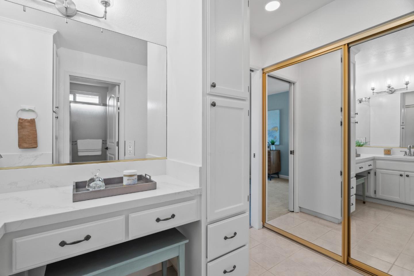 3585 Surry Place Fremont, CA 94536 - Photo 22 of 47 a bathroom with a shower sink and mirror