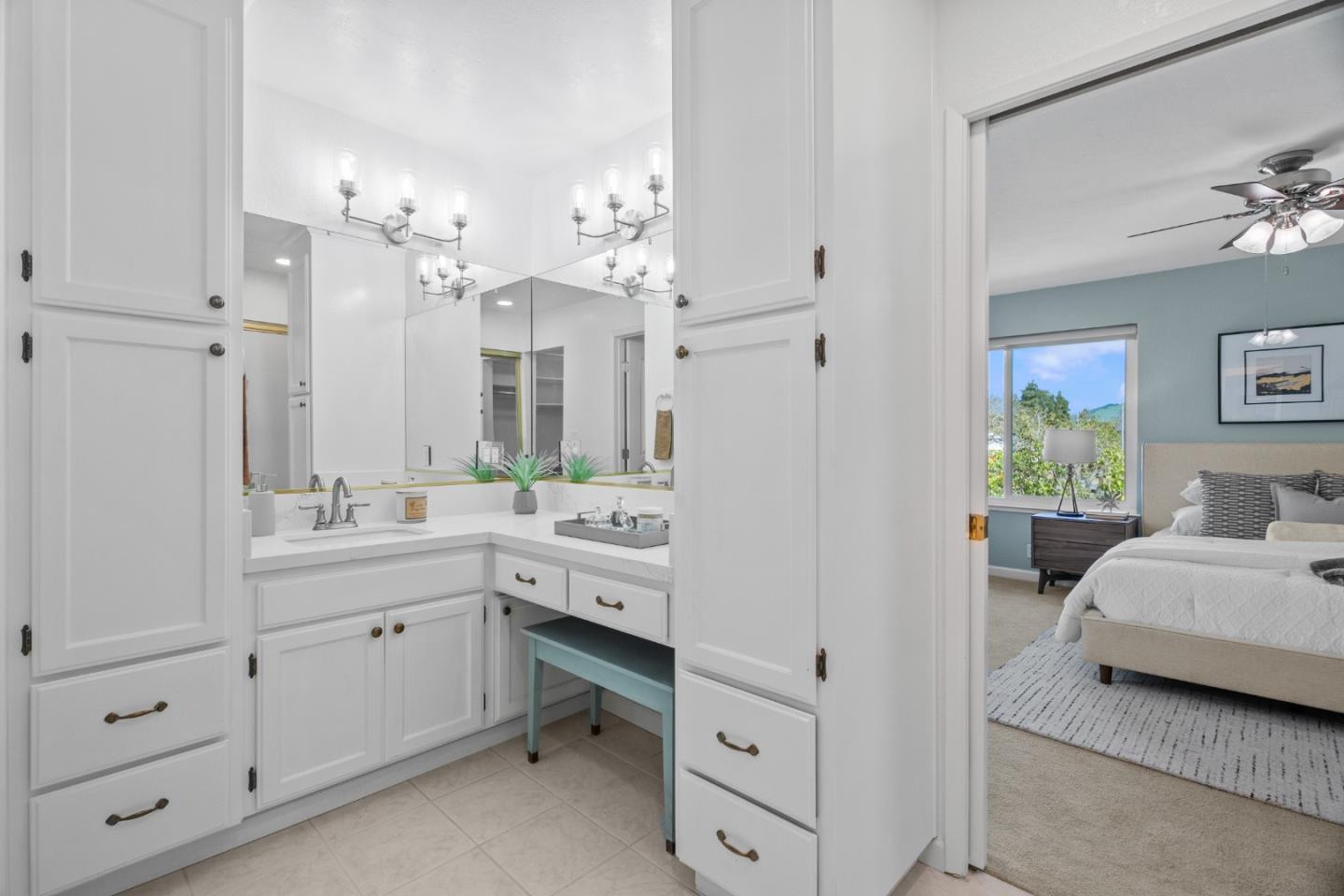 3585 Surry Place Fremont, CA 94536 - Photo 23 of 47 a spacious en suite bathroom with a double vanity sink and a mirror