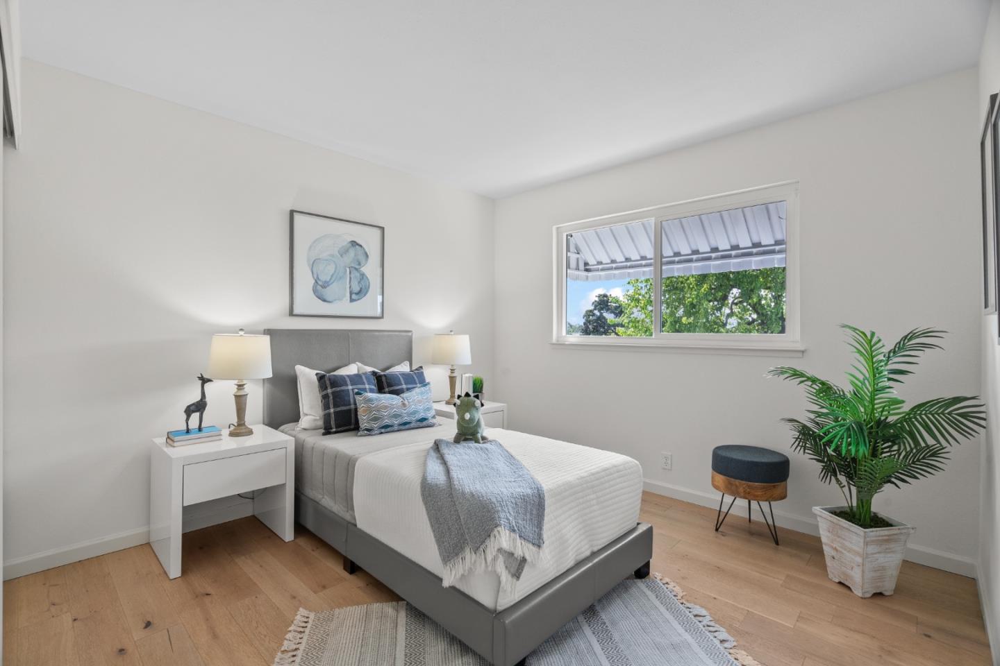 3585 Surry Place Fremont, CA 94536 - Photo 25 of 47 a bedroom with a bed and a potted plant