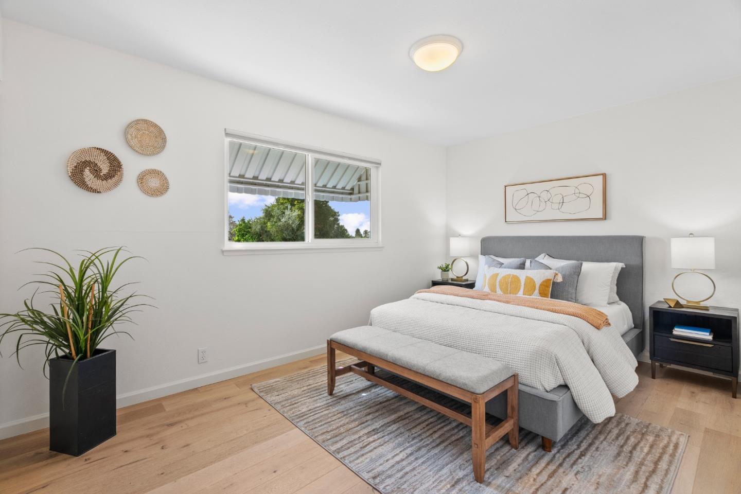 3585 Surry Place Fremont, CA 94536 - Photo 26 of 47 a bed room with a bed and a potted plant