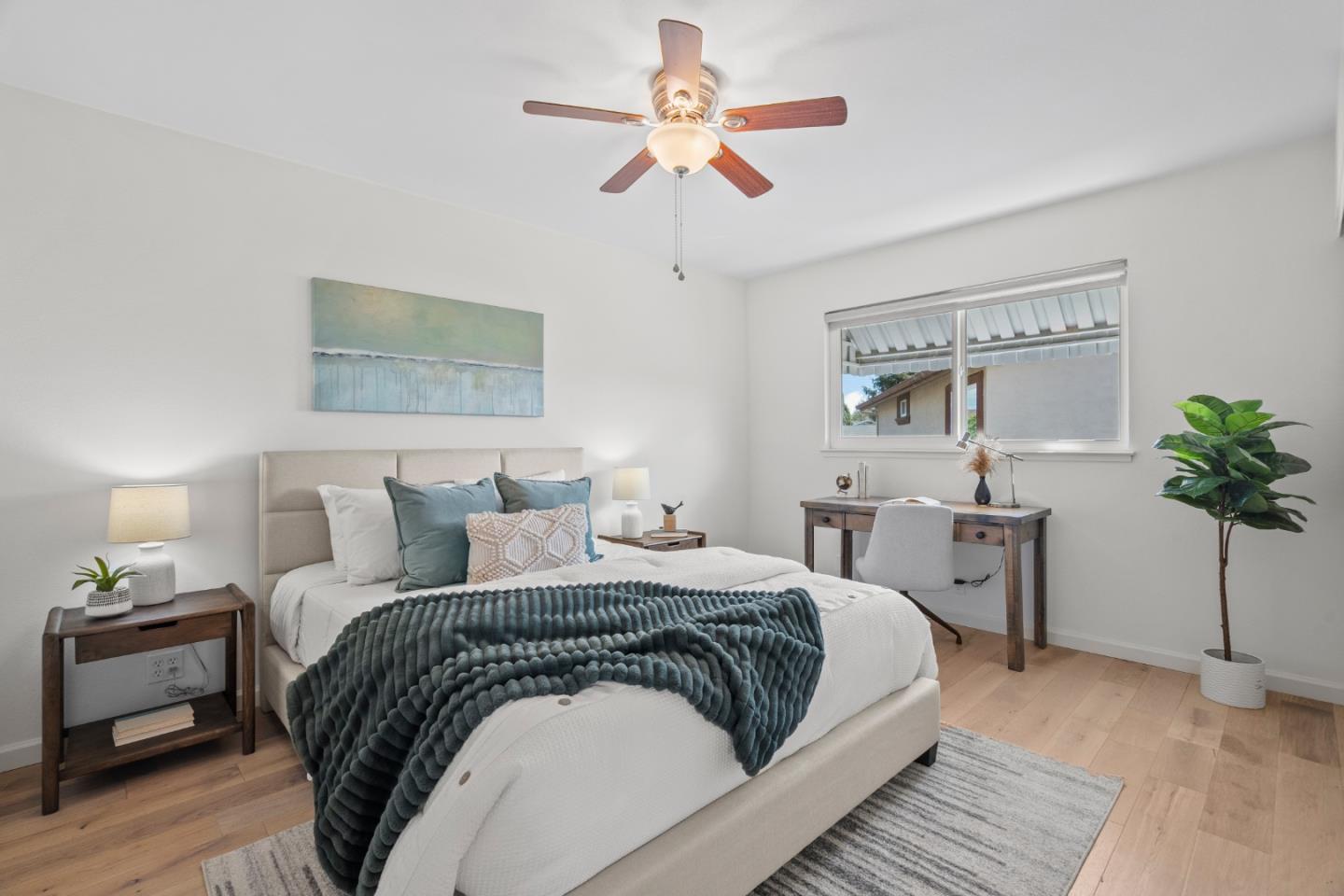 3585 Surry Place Fremont, CA 94536 - Photo 27 of 47 a bedroom with a large bed and a chandelier