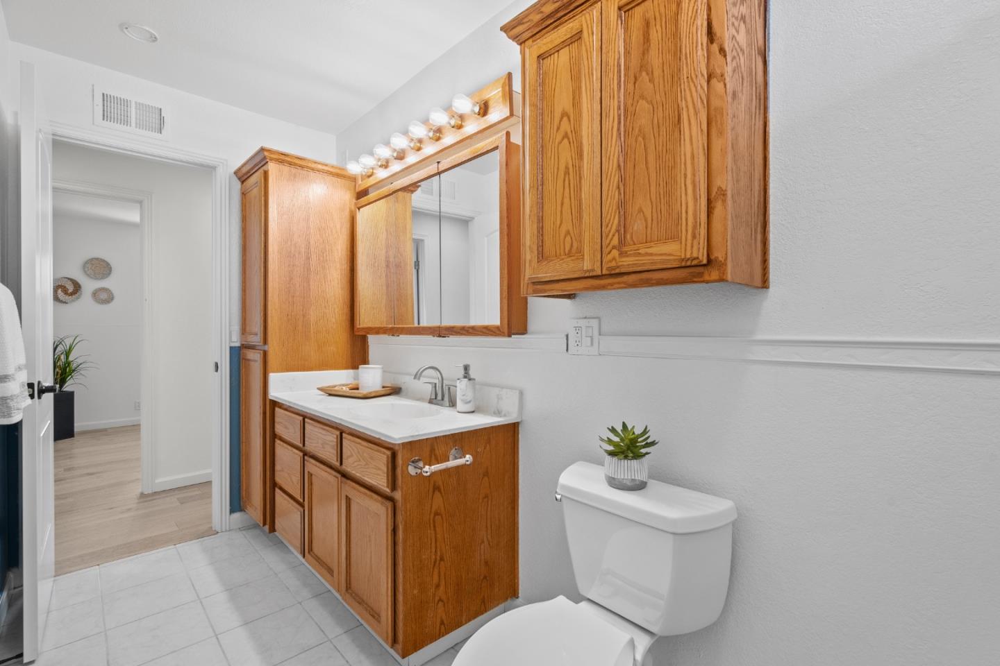 3585 Surry Place Fremont, CA 94536 - Photo 29 of 47 a bathroom with a sink a toilet and mirror