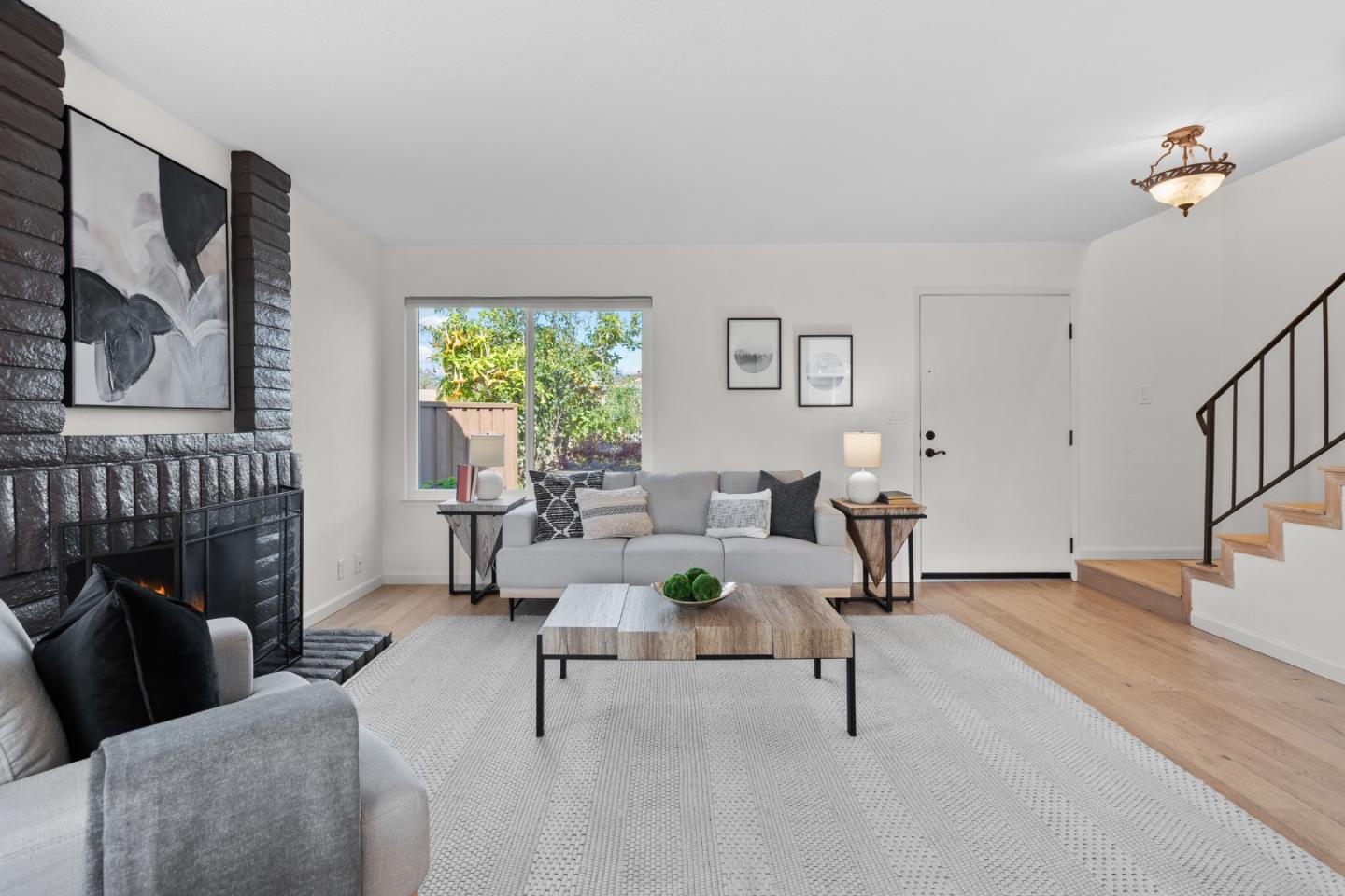 3585 Surry Place Fremont, CA 94536 - Photo 3 of 47 a living room with furniture and a fireplace