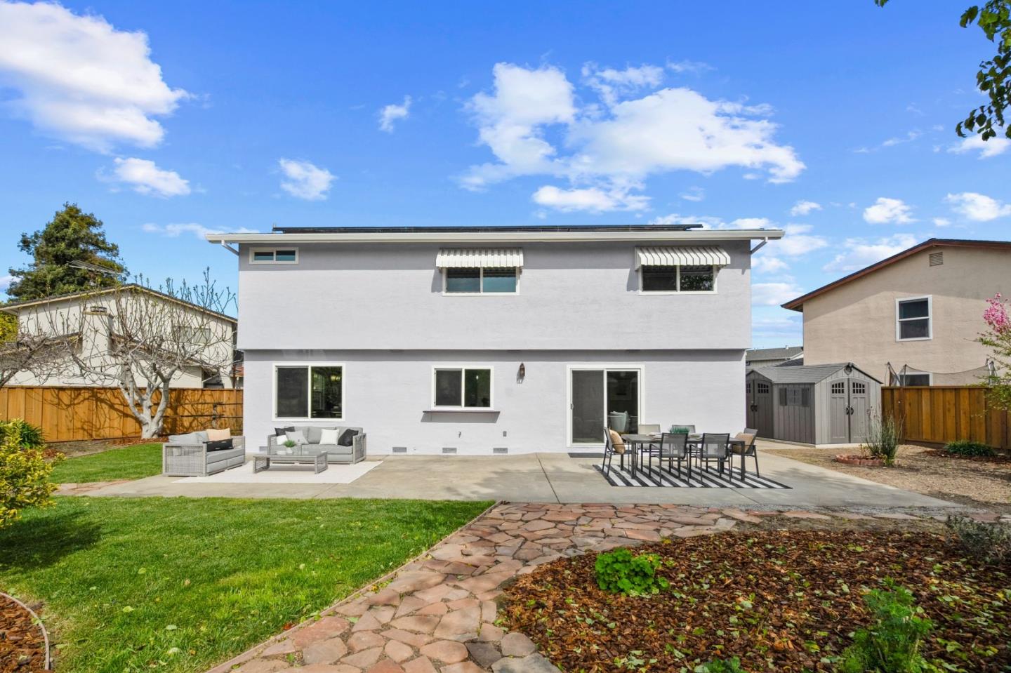 3585 Surry Place Fremont, CA 94536 - Photo 32 of 47 a front view of a house with garden