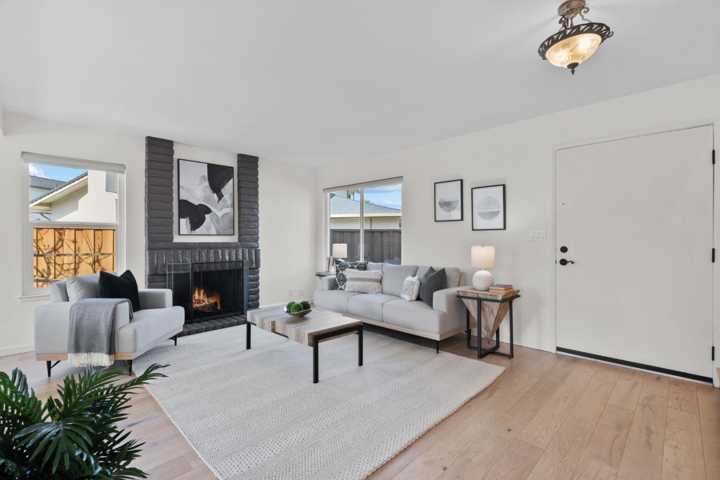 3585 Surry Place Fremont, CA 94536 - Photo 4 of 47 a living room with furniture and a fireplace