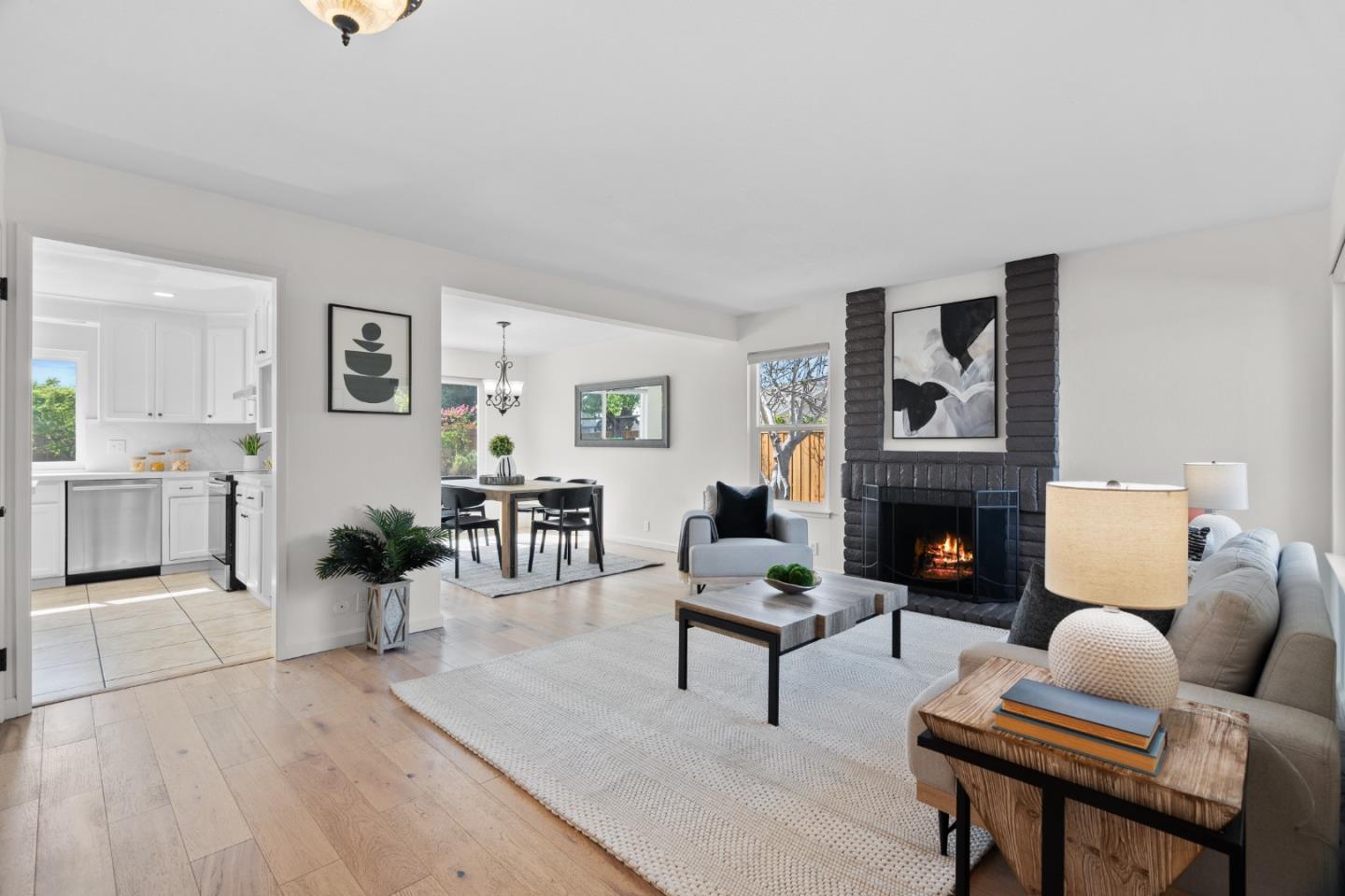 3585 Surry Place Fremont, CA 94536 - Photo 6 of 47 a living room with furniture and a fireplace