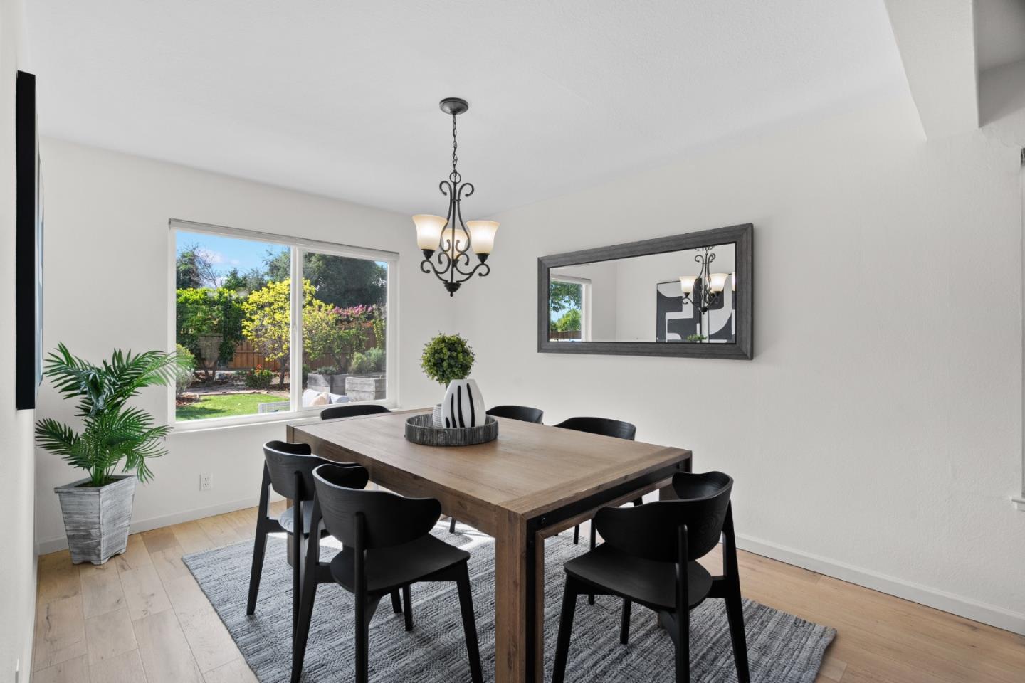 3585 Surry Place Fremont, CA 94536 - Photo 7 of 47 a view of a dining room with a table and chairs