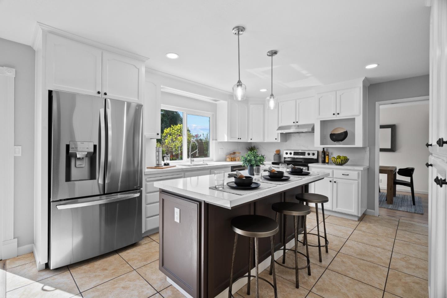 3585 Surry Place Fremont, CA 94536 - Photo 10 of 47 a kitchen with stainless steel appliances granite countertop a sink a stove a refrigerator and island with wooden floor
