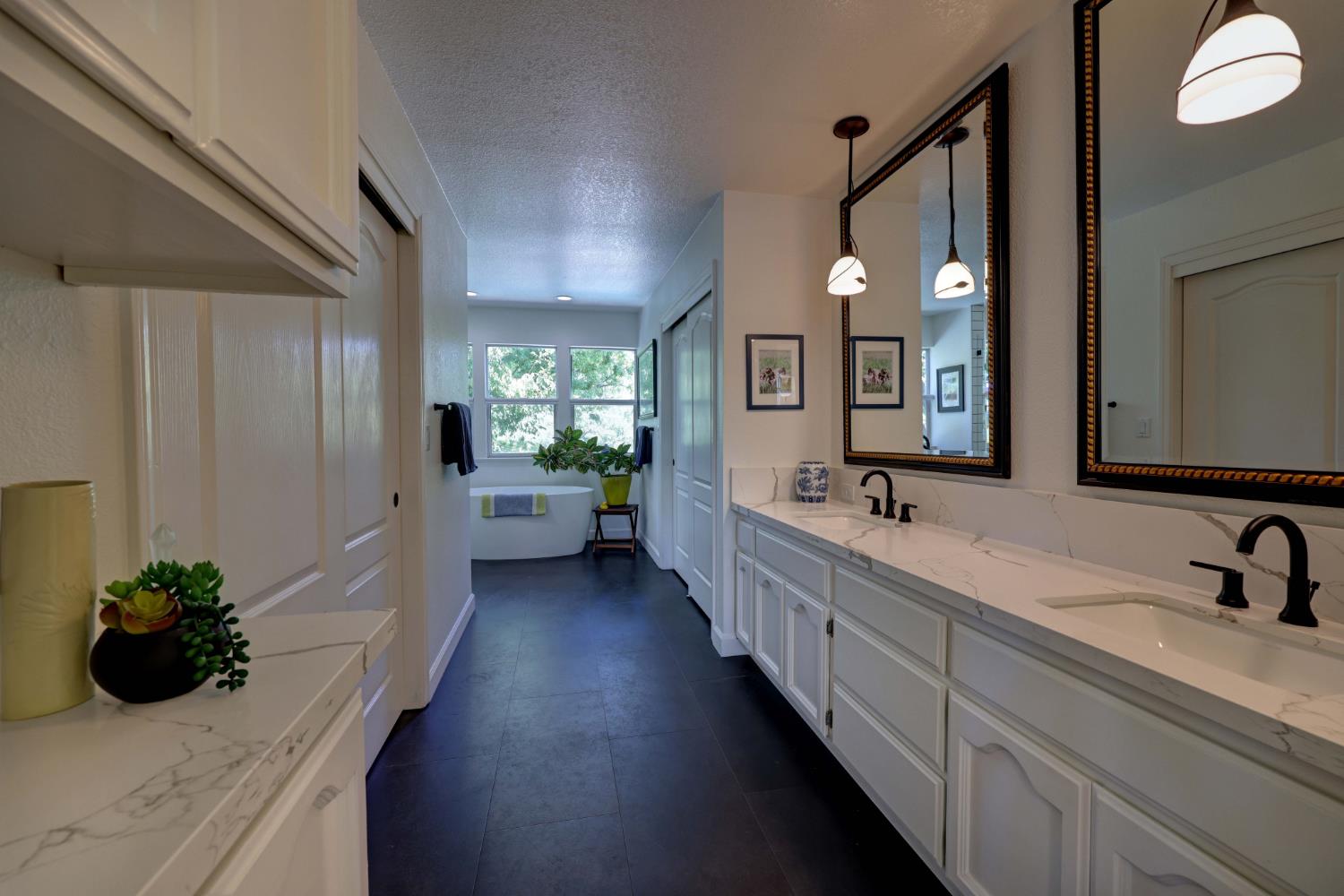 8801 Villa Campo Way Fair Oaks, CA 95628 - Photo 38 of 64 Spacious master bath with Quartz counters and his and hers separate walk-in closets.