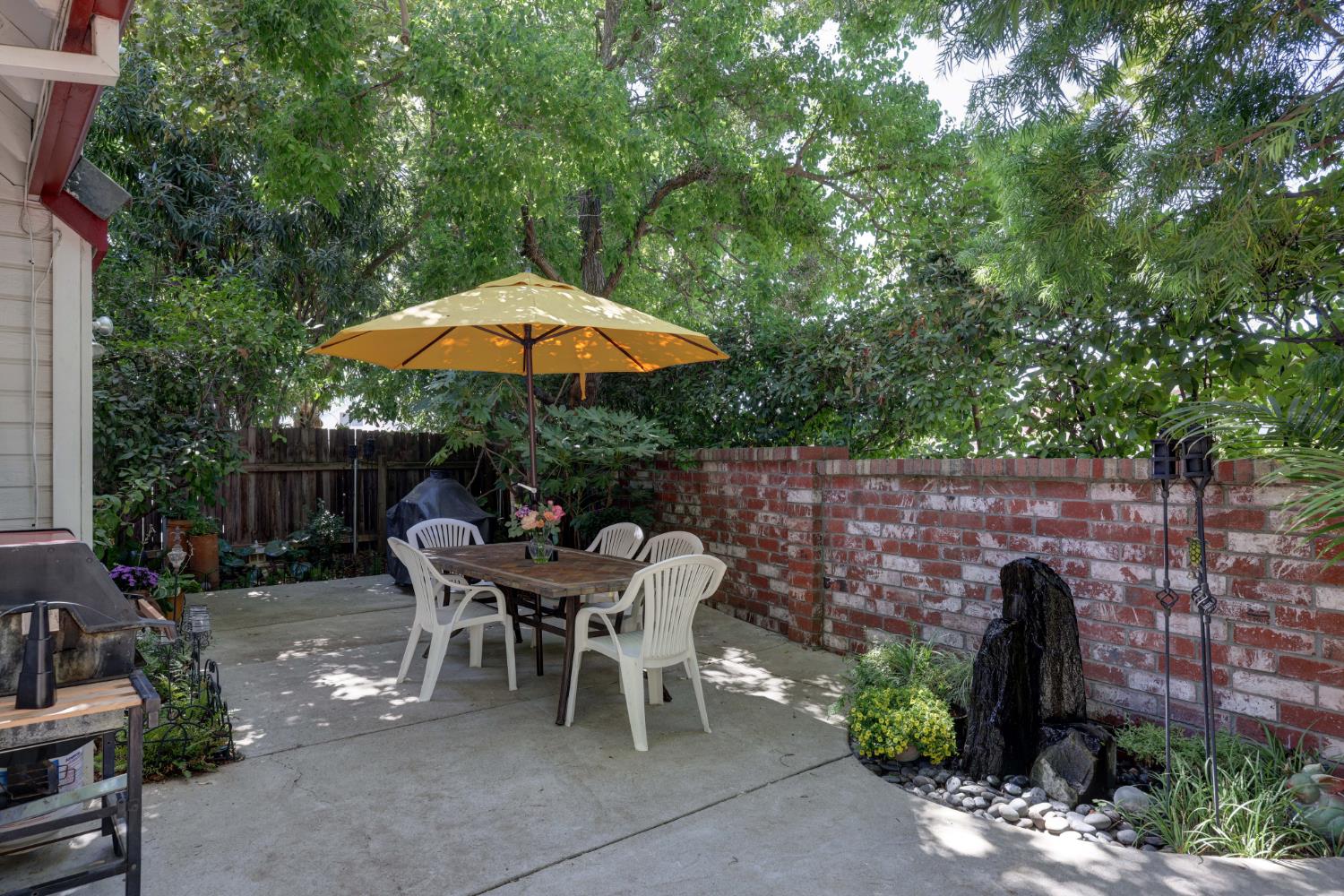 8801 Villa Campo Way Fair Oaks, CA 95628 - Photo 63 of 64 Outdoor peaceful dining area with fountain.