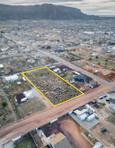 740 Elm Street, Unit 12 Hildale, UT 84784 - Photo 5 of 11 Aerial view of property's location featuring mountains and property boundaries highlighted