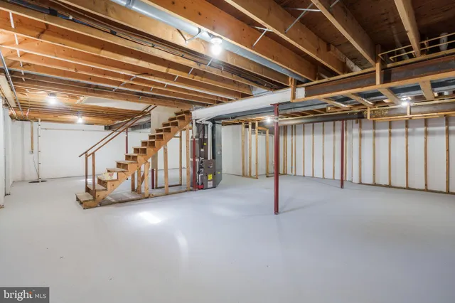a view of an empty room with stairs